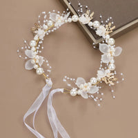 Couronne-de-fleurs-pour-cheveux-blanche